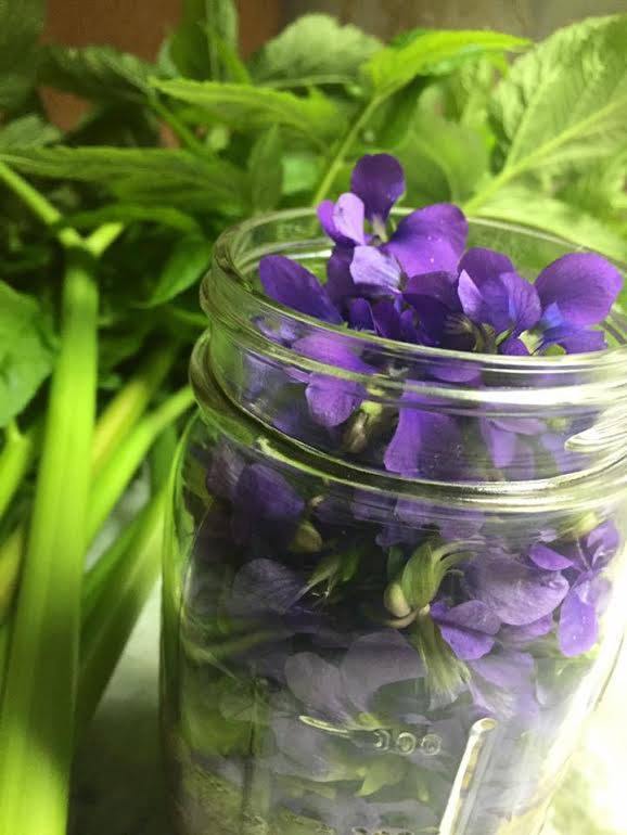 Jar of Violet flowers
