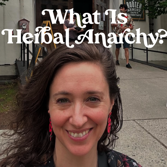 Amanda standing in front of the Herbstalk sign in Somerville MA